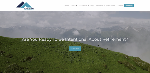 Screenshot of a website called intentional wealth and the background image is a drone shot of 2 people in the distance hiking up a green mountain side with mountain peaks in the distance.
